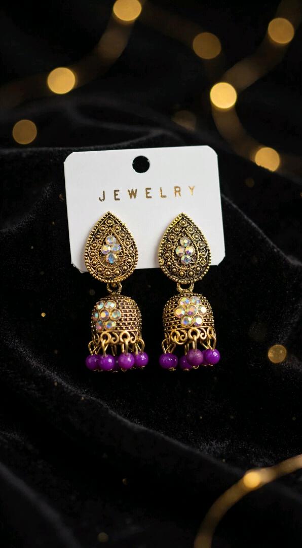 Antique Gold Purple Jhumka Earrings with AD Stones