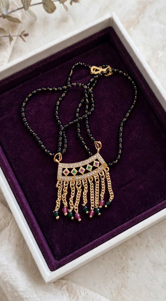 Gold-Plated Traditional Mangalsutra with CZ Diamond Pendant | Black Beads | Pink-Green Stone Tassels | Wedding Collection